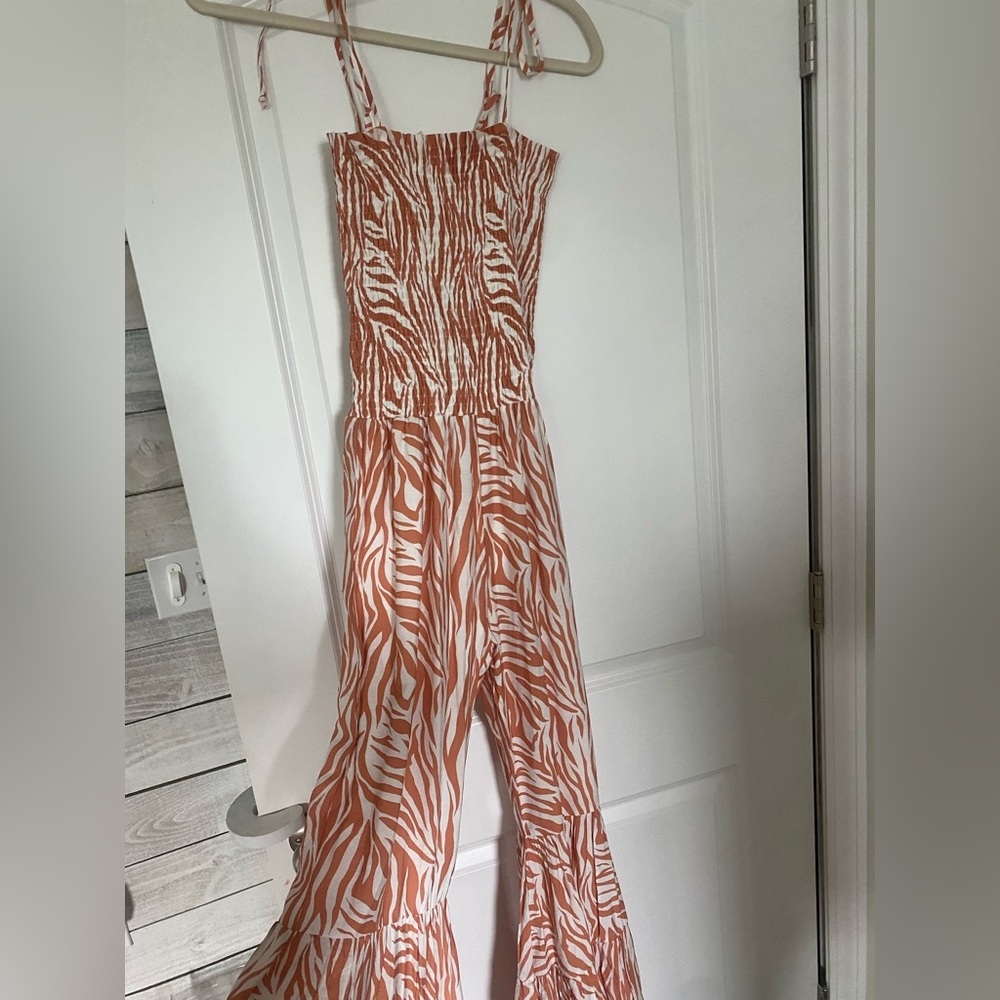 Size Medium  NWT orange and white Jumpsuit